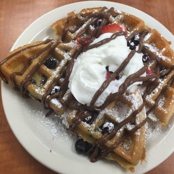 Loaded Cafe - Strawberry and blueberry waffles with a drizzle of Nutella - Breakfast & Brunch Near Me - Gardena, California Loaded Cafe - Strawberry and blueberry waffles with a drizzle of Nutella - Breakfast & Brunch Near Me - Gardena, California