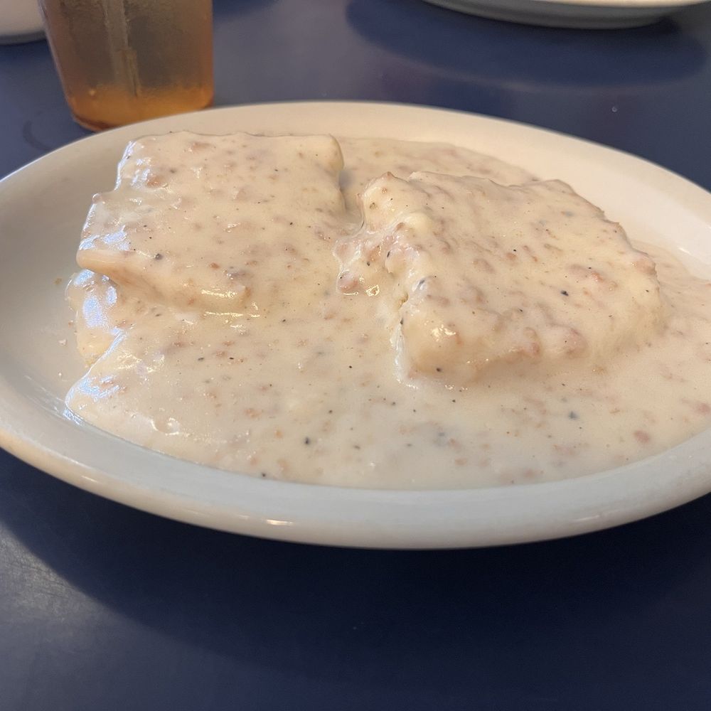 Honeybees - Sausage gravy and biscuit (half order) - New American Near Me - Geneva, Ohio Honeybees - Sausage gravy and biscuit (half order) - New American Near Me - Geneva, Ohio