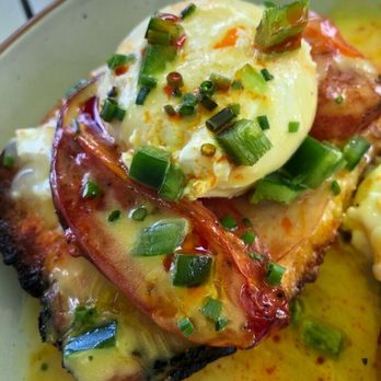 Canvas - Canvas Benedict - Housemade canadian bacon, Oven-dried tomato, Poached egg, Warm biscuit, Jalapeño hollandaise - New American Near Me - Orlando, Florida Canvas - Canvas Benedict - Housemade canadian bacon, Oven-dried tomato, Poached egg, Warm biscuit, Jalapeño hollandaise - New American Near Me - Orlando, Florida