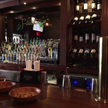 Astoria Tavern - a bar with a lot of bottles of wine - Irish Pub Near Me - Astoria, New York Astoria Tavern - a bar with a lot of bottles of wine - Irish Pub Near Me - Astoria, New York