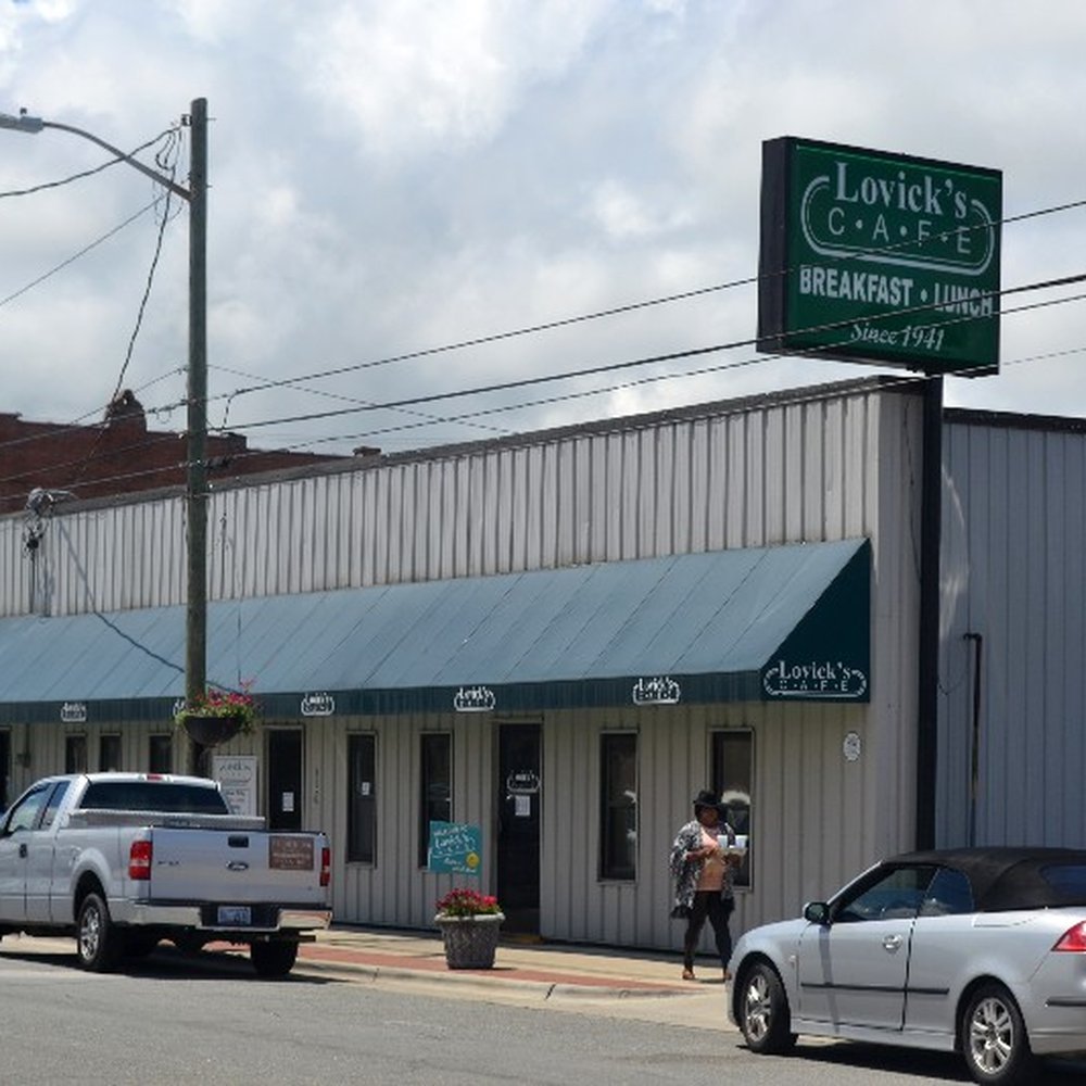 Lovick's Cafe - cars parked on the side of the road - Breakfast & Brunch Near Me - Kinston, North Carolina Lovick's Cafe - cars parked on the side of the road - Breakfast & Brunch Near Me - Kinston, North Carolina