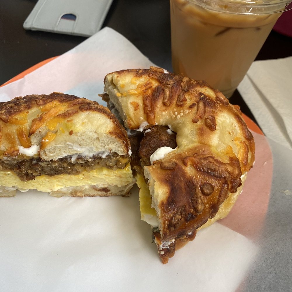 Rusty Cup - veggie sausage egg and cheese on a jalapeño cheese bagel. iced latte with oat milk - Coffee & Tea Near Me - Astoria, Oregon Rusty Cup - veggie sausage egg and cheese on a jalapeño cheese bagel. iced latte with oat milk - Coffee & Tea Near Me - Astoria, Oregon
