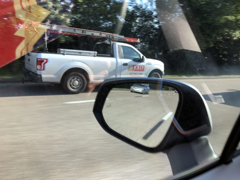 Slide of Jolly Roofing