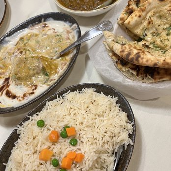 Herbs Indian Cuisine - 2. Samosa Chat, 72. Garlic Naan, 62. Lamb Rogan Josh - Indian Near Me - Hurst, Texas Herbs Indian Cuisine - 2. Samosa Chat, 72. Garlic Naan, 62. Lamb Rogan Josh - Indian Near Me - Hurst, Texas