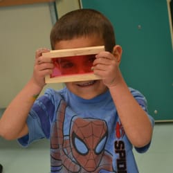 Brookville Center For Childrens Services - A preschooler gets creative with blocks.