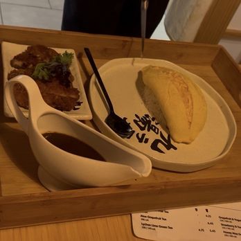 Kyuramen x TBaar- UCF - Omurice on white rice with tonkotsu pork on the side - Ramen Near Me - Orlando, Florida