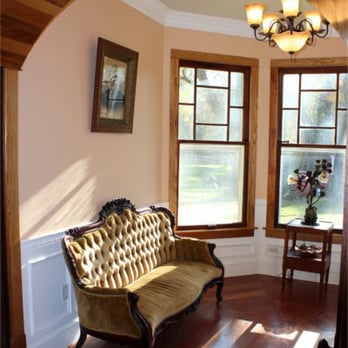 Millsap-Baker Estate - Sitting room in the sunset light through its original "wavy glass" windows - Bed & Breakfast Near Me - Damascus, Virginia