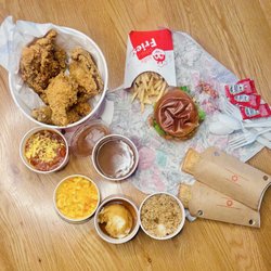 Jollibee - 6pc bucket with 4 sides and deluxe spicy chicken sandwich.