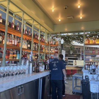 L'Aperitivo - a man standing at a bar - Wine Bars Near Me - Las Vegas, Nevada L'Aperitivo - a man standing at a bar - Wine Bars Near Me - Las Vegas, Nevada
