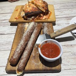 Joe's Rotisseria - Thunder sticks and chicken parm sandwich on garlic bread