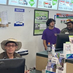 U-Haul - Salvador, a employee and Zach from left to right
