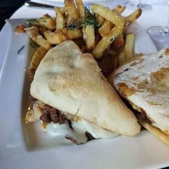 Canoe - Lamb sandwich with truffle fries - New American Near Me - Atlanta, Georgia Canoe - Lamb sandwich with truffle fries - New American Near Me - Atlanta, Georgia