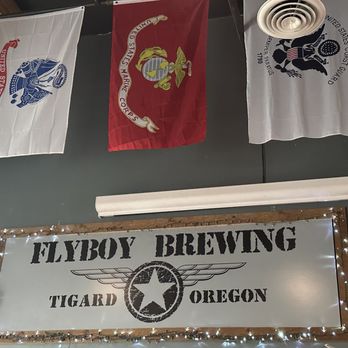 FlyBoy Brewery & Pub - flags hanging from the ceiling - Pubs Near Me - Tigard, Oregon FlyBoy Brewery & Pub - flags hanging from the ceiling - Pubs Near Me - Tigard, Oregon
