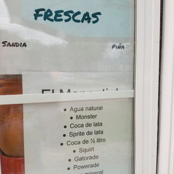 Refresqueria El Manatial - a sign in a window - Food Stands Near Me - Houston, Texas Refresqueria El Manatial - a sign in a window - Food Stands Near Me - Houston, Texas