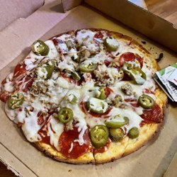 Johnny's Tavern - Gluten free pepperoni, Italian sausage, and jalapeño pizza.  Take out.