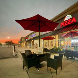 Pisano's Pizzeria - The patio is calling your name.  Our chairs are waiting for you to relax and enjoy dinner and the view.