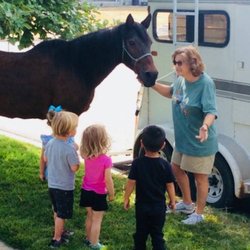 Growing Minds Learning Academy - Ms. Meg loves bringing her horse Classy to the Academy to help the children learn about farm animals.