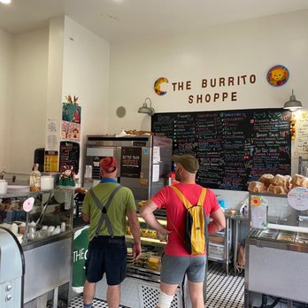 The Burrito Shoppe - two men standing in front of the counter - Salad Near Me - Staten Island, New York The Burrito Shoppe - two men standing in front of the counter - Salad Near Me - Staten Island, New York