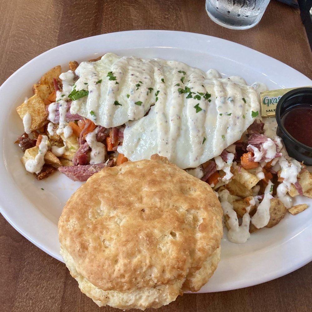 Corned beef hash with biscuit and homemade strawberry jam