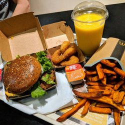 McDonald's - Crispy chicken burger, crispy shrimp with chili sauce, mango pineapple smoothie, sweet potato fries.