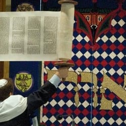 Temple Israel Ner Tamid - Rabbi Matt displays the Torah during the hakafa.