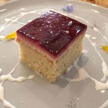 Emmer & Rye - I got this tres leches cheesecake because I was puzzled by the description...but it's just a layer of cheesecake on top of tres leches cake. - Tapas/Small Plates Near Me - Austin, Texas