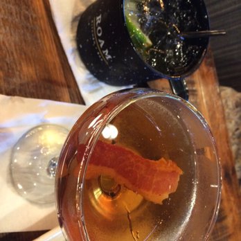 ROAM Kitchen + Bar - Maple bacon manhattan and Moscow mule. As tasty as they look! - New American Near Me - Sioux Falls, South Dakota ROAM Kitchen + Bar - Maple bacon manhattan and Moscow mule. As tasty as they look! - New American Near Me - Sioux Falls, South Dakota