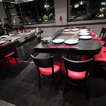 Benihana - Temecula - a restaurant with a large table and red chairs - Sushi Bars Near Me - Temecula, California Benihana - Temecula - a restaurant with a large table and red chairs - Sushi Bars Near Me - Temecula, California