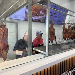 Hanging roast pork and roast duck. Hanging roast pork and roast duck.