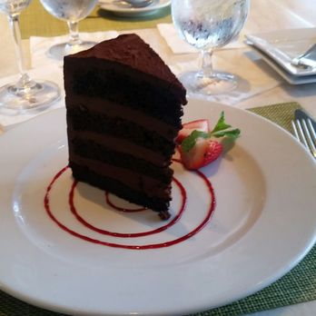 Mariposa - Valrona chocolate cake, with a raspberry sauce - New American Near Me - Honolulu, Hawaii Mariposa - Valrona chocolate cake, with a raspberry sauce - New American Near Me - Honolulu, Hawaii