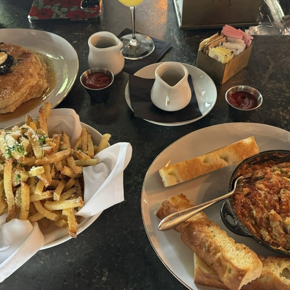 Prime 120 - Pancakes, truffle, fries, wood-oven baked eggs with focaccia toast - Steakhouses Near Me - Woodstock, Georgia
