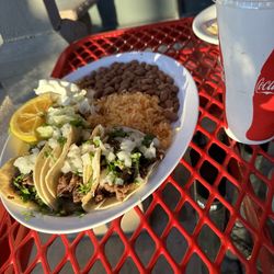 Las Delicias - The combination of tree tacos with rice and beans " yum"
