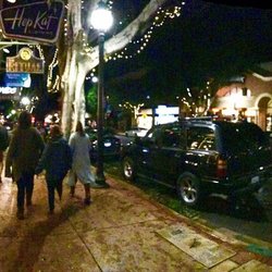 Hep Kat Clothing - A panorama picture of Hepkat and other shops on Higuera Street after dark, around 10pm"ish, Valentines week, 2017.