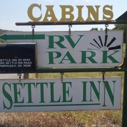 Settle Inn RV Park & Cabins - Sign on hwy 99, telling you were to turn on road to the Settle Inn campground