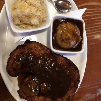 Hessen Haus - Jagerschnitzelwith mushroom gravy , mashed potatoes and sauerkraut - German Near Me - Des Moines, Iowa
