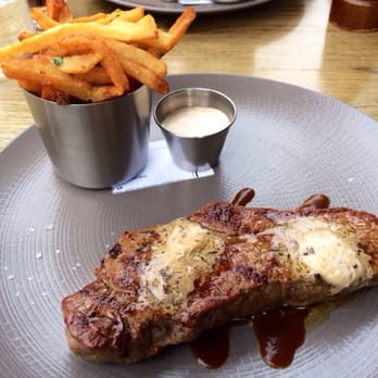 The Dawson - NY strip steak and garlic fries at The Dawson - American Near Me - Chicago, Illinois The Dawson - NY strip steak and garlic fries at The Dawson - American Near Me - Chicago, Illinois