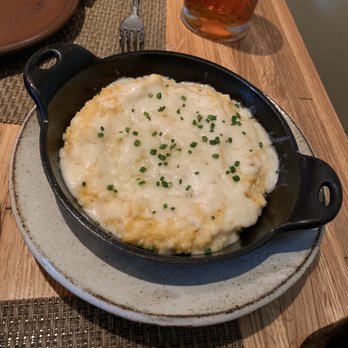 Husk - Greg Johnsman Baked Grits with TN Sweetwater Valley Cheddar - American Near Me - Charleston, South Carolina Husk - Greg Johnsman Baked Grits with TN Sweetwater Valley Cheddar - American Near Me - Charleston, South Carolina