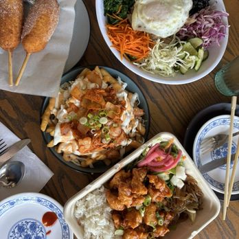 Kimchi Box - Korean corn dogs, kimchi fries, popcorn chicken box with Korean sassy sauce, and Bibimap - Korean Near Me - Sterling Heights, Michigan Kimchi Box - Korean corn dogs, kimchi fries, popcorn chicken box with Korean sassy sauce, and Bibimap - Korean Near Me - Sterling Heights, Michigan