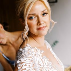 Raquel Chacon Beauty - Soft glam makeup and a romantic updo with face-framing tendrils for this radiant bride. On-location luxury styling to elevate your big day.