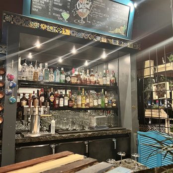 Bar Rio - Bar area with different choices of liquor - Tapas Bars Near Me - Bend, Oregon