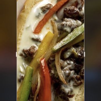 The Angry Elephant - The Ben Franklin Philly Cheese Steak Dog - Sports Bars Near Me - Magnolia, Texas The Angry Elephant - The Ben Franklin Philly Cheese Steak Dog - Sports Bars Near Me - Magnolia, Texas