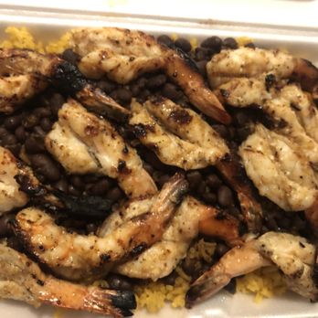 Dominy Restaurant and Bakery - Grilled shrimp over yellow rice and black beans - Bakeries Near Me - East Orange, New Jersey Dominy Restaurant and Bakery - Grilled shrimp over yellow rice and black beans - Bakeries Near Me - East Orange, New Jersey