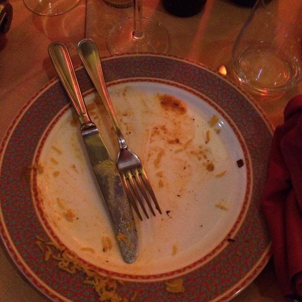My empty plate. The portions were small and the price was very high.