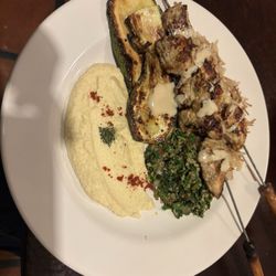 Fenicia - Chicken skewers with hummus, tabbouleh, roasted zucchini strips and rice pilaf