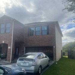 Riley's Seamless Gutters - Two-story Installation with 2 x 3 Downspouts