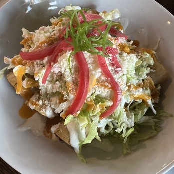 J Riley Distillery - Potato taquitos with lettuce, queso fresco, & pickled onion - Distilleries Near Me - Redlands, California