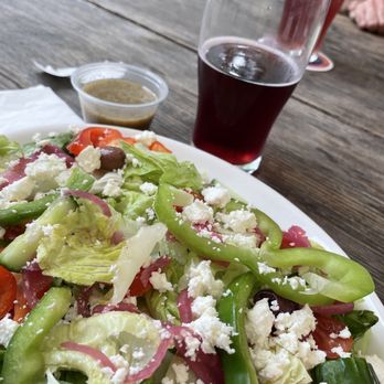 Rock Creek Tavern - Greek Salad with peach/blueberry cider - Pubs Near Me - Hillsboro, Oregon Rock Creek Tavern - Greek Salad with peach/blueberry cider - Pubs Near Me - Hillsboro, Oregon
