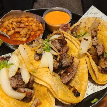 Queso's Plainfield - My husband found the steak tacos delicious with charro beans. - Bars Near Me - Plainfield, Indiana