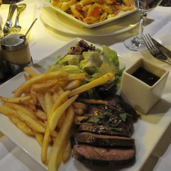 Chez Ribe - Seared duck breast with a five spice honey glaze and pomme frites. - Brasseries Near Me - Paris, 75 Chez Ribe - Seared duck breast with a five spice honey glaze and pomme frites. - Brasseries Near Me - Paris, 75