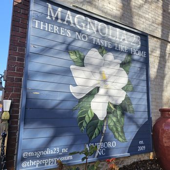 Magnolia 23 - On the wall of the outside seating area - Soul Food Near Me - Asheboro, North Carolina Magnolia 23 - On the wall of the outside seating area - Soul Food Near Me - Asheboro, North Carolina